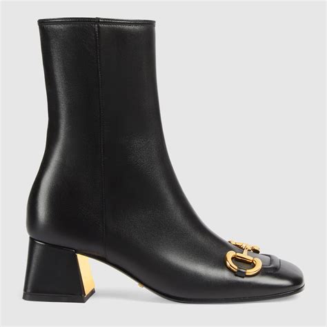 gucci nere con fiamme|Stivaletto donna con fibbie in pelle nera .